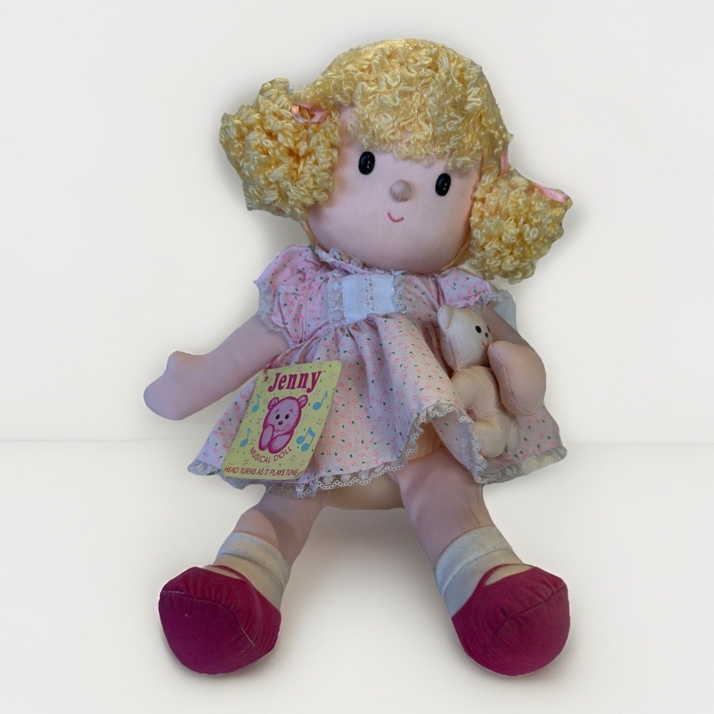 Russ Berrie "Jenny" Musical Doll Plays Over The Rainbow. Blond Hair Pink Dress
